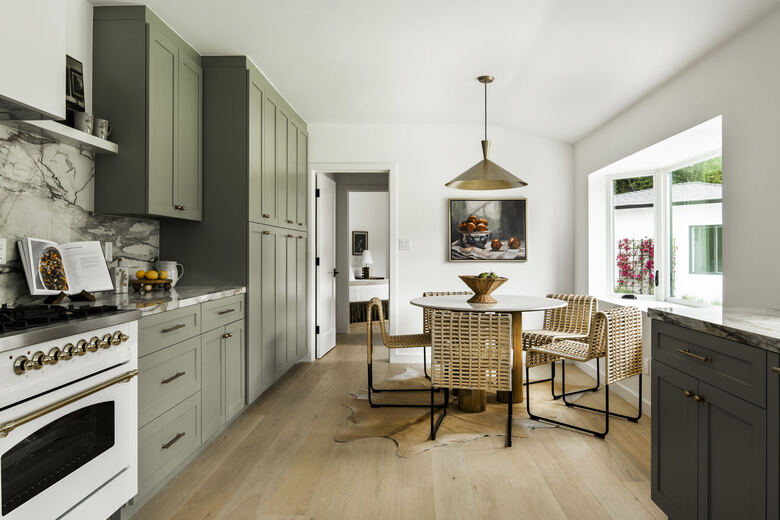 Sage kitchen with dining nook