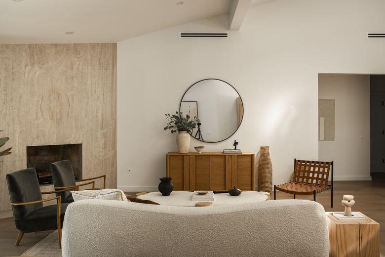 Living room with round mirror